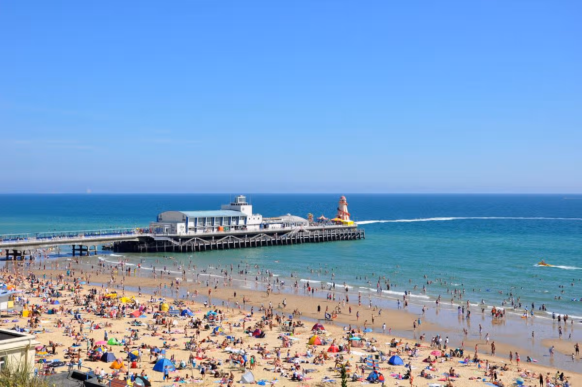 Police hunt for witnesses after woman attacked in the sea at Bournemouth beach